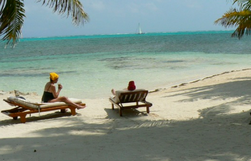 belize beach with tourists