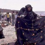 Berber blanket seller.