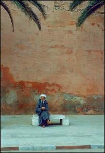Essaouira man on bench.