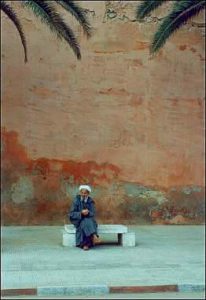 Essaouira man on bench.