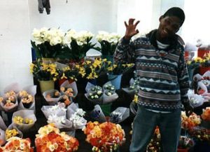 Young flower vendor