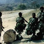 Roadside boys in leaf costumes