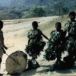 Roadside boys in leaf costumes