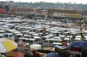 Taxi vans crammed into the taxi terminal. Vans are often loaded