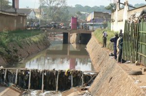 Polluted waterway near center of town