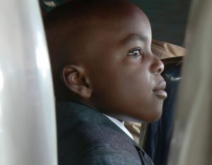 Boy looking outside