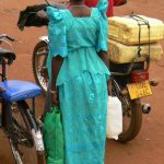 Masindi women often dress in bright colors