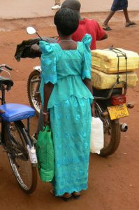 Masindi women often dress in bright colors