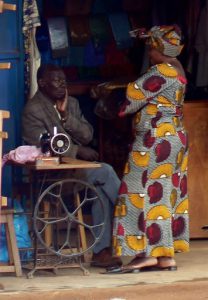 Masindi taylor and colorful friend; women often dress in bright