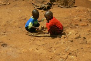 Mesindi (or Masindi) children improvise toys from sticks and stones