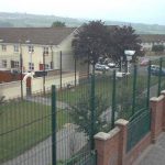 Divider 'peace' fences in Catholic-Protestant neighborhood (note security camera)
