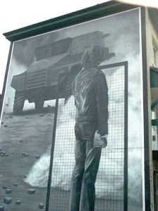 Derry wall mural of 'typical Saturday afternoon riot' during 1970's