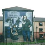 Derry wall mural of Bernadette Devlin protesting for Catholic civil