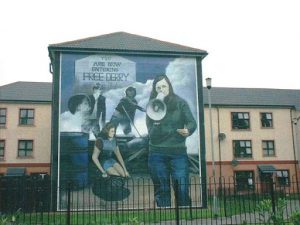 Derry wall mural of Bernadette Devlin protesting for Catholic civil
