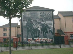 Derry wall mural of peaceful civil rights march that became