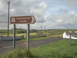 North Coast road with castle sign