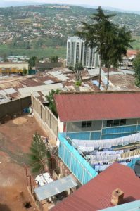 Shanties and upscale apartments near city center in Kigali.