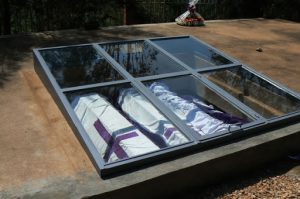 Genocide Memorial in Kigali - glass windows look into mass