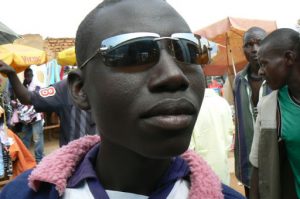 Selling sun glasses in Kigali.