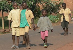 Kids coming home from school. Even in poor schools there