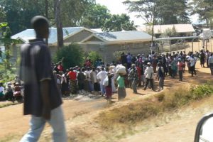 Kibera residents walking to food distribution centers after the riots