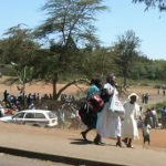 Riots victims gathering for food aid