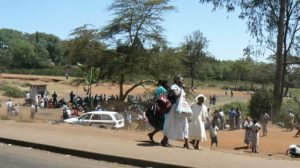 Riots victims gathering for food aid