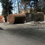 Burned debris along the main road.