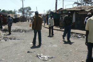 Charred and littered streets after the first wave of rioting