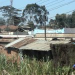 The slum shacks seem to spread out for miles.