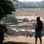 A view across tin-roofed slum