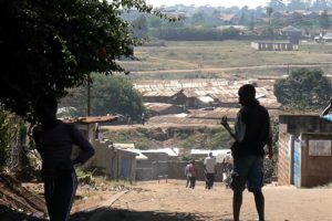 A view across tin-roofed slum