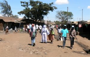 Kibera has mostly unpaved roads and people live in tin