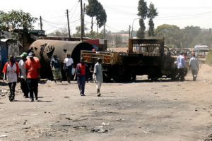 Burned out truck and disarray from riots