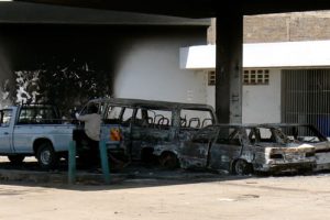 Burned out vehicles from riots a dew days before