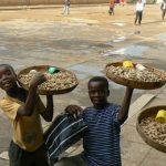 Kids selling peanuts in central