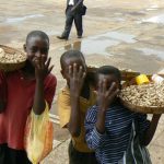 Kids selling peanuts in central