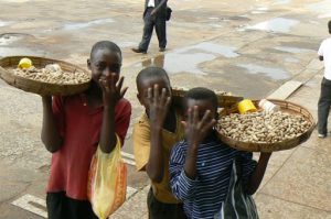 Kids selling peanuts in central