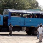 Safari tour truck popular with young people, waiting at the