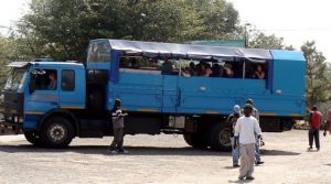 Safari tour truck popular with young people, waiting at the