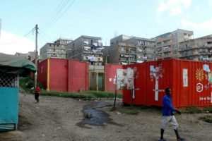 Methare high-rise residential blocks with sewage seeping out. The red boxes