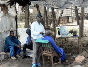 Resourceful as usual, a barber opened his 'shop' for business