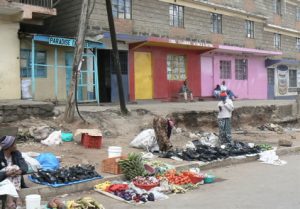 Street vendors are present everyday everywhere in Kenya,  sometimes dancing