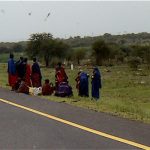 Masai waiting for transportation
