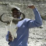 Guide at the site of the Zinjanthropus skull discovery in