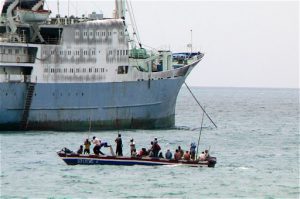 Stering boat on water