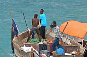 Fishermen coming into port.