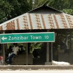 Sign - Zanzibar Town 10 miles.