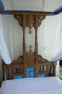 Typical carved Zanzibar bed