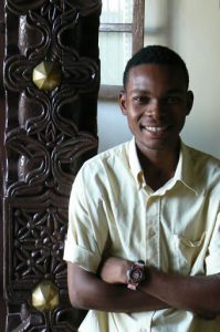 Greg, a hotel reception clerk in Stone Town.